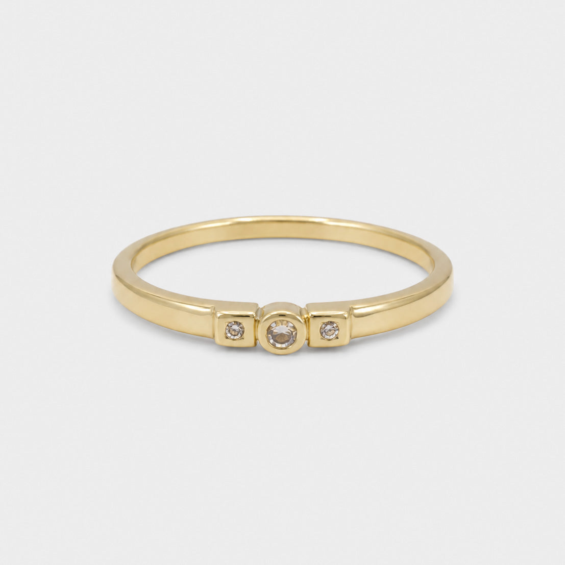 Valencia ring in solid 9ct gold, three graduated cubic zirconia on a tapered band, front view