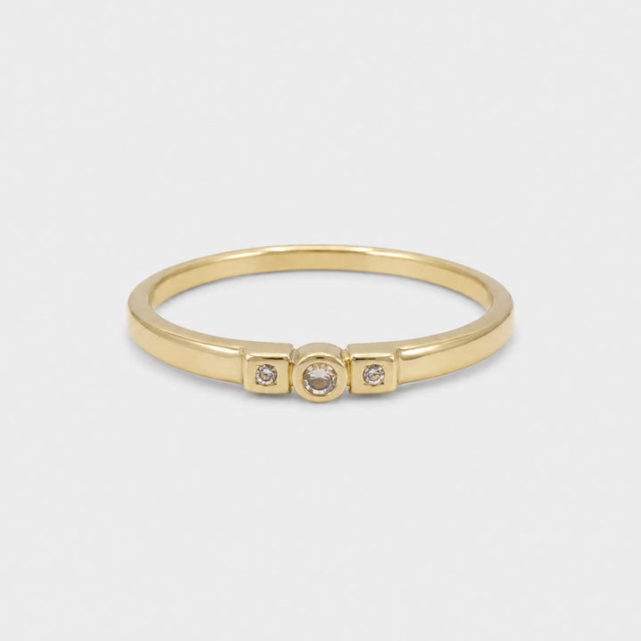Valencia ring in solid 9ct gold, three graduated cubic zirconia on a tapered band, front view